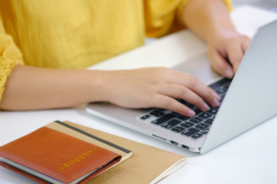 female using laptop table